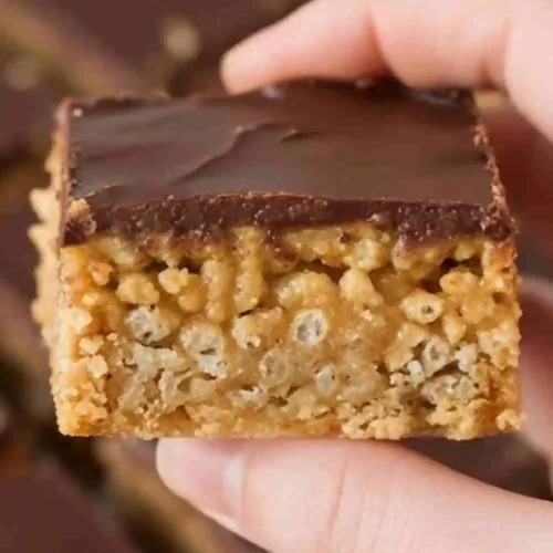 Close-up of an easy no-bake peanut butter bar with chocolate topping.