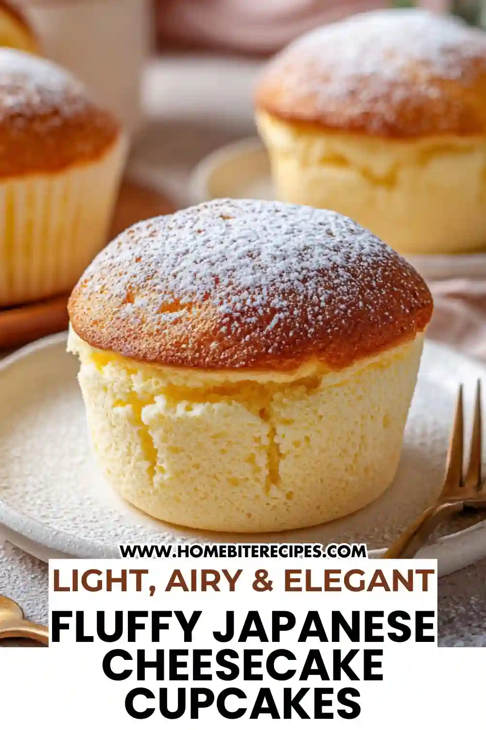 Close-up of a fluffy Japanese cheesecake cupcake dusted with powdered sugar, showcasing its soft, airy texture and golden top.