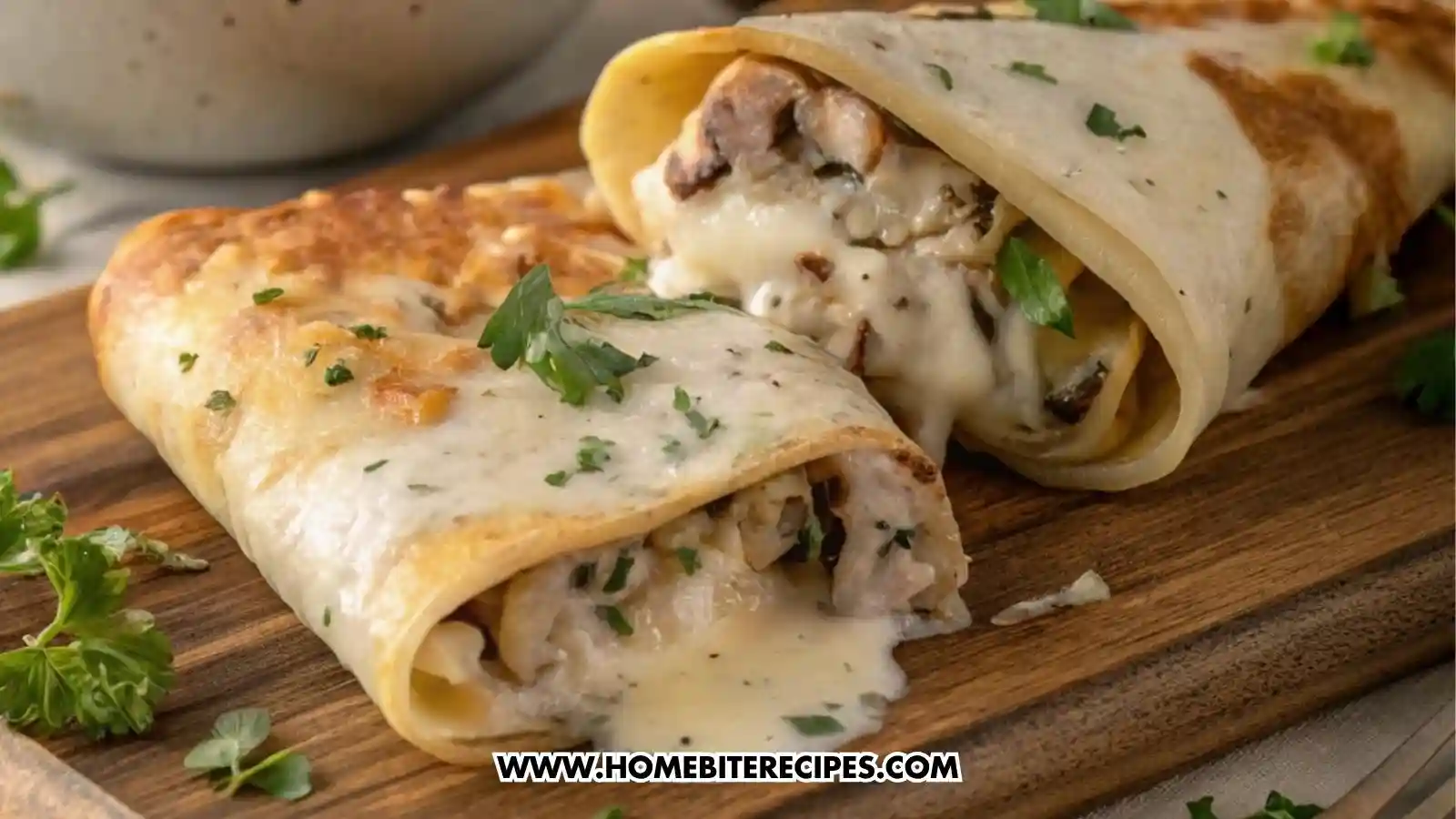 Savory crêpe casserole filled with shredded chicken, mushrooms, and creamy béchamel sauce, topped with melted golden cheese inside a steaming skillet