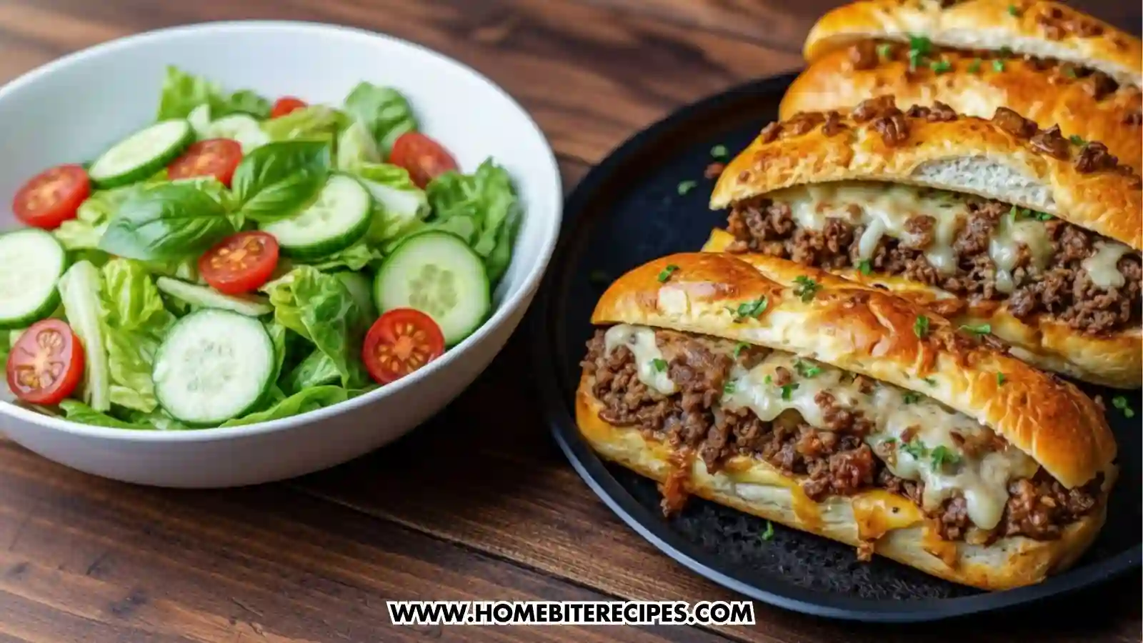 Cheesy Ground Beef Stuffed Garlic Bread served with fresh salad of lettuce, cucumbers, and cherry tomatoes