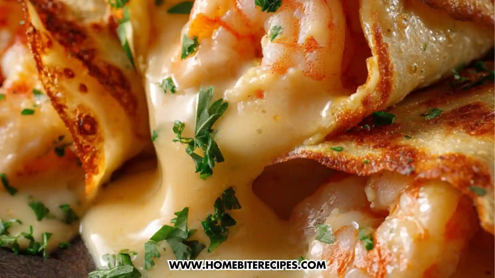 Golden crêpes stuffed with creamy garlic shrimp and melted cheese, garnished with herbs