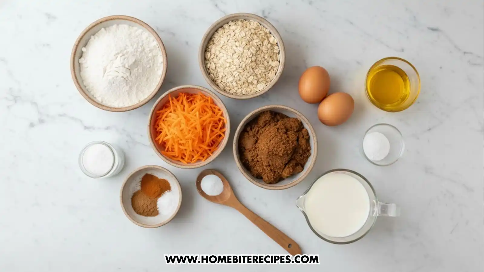 Flat lay of Healthy Carrot and Oat Muffins  ingredients including flour, rolled oats, shredded carrots, brown sugar, eggs, milk, oil, baking powder, cinnamon, and salt arranged in small bowls on a marble countertop.