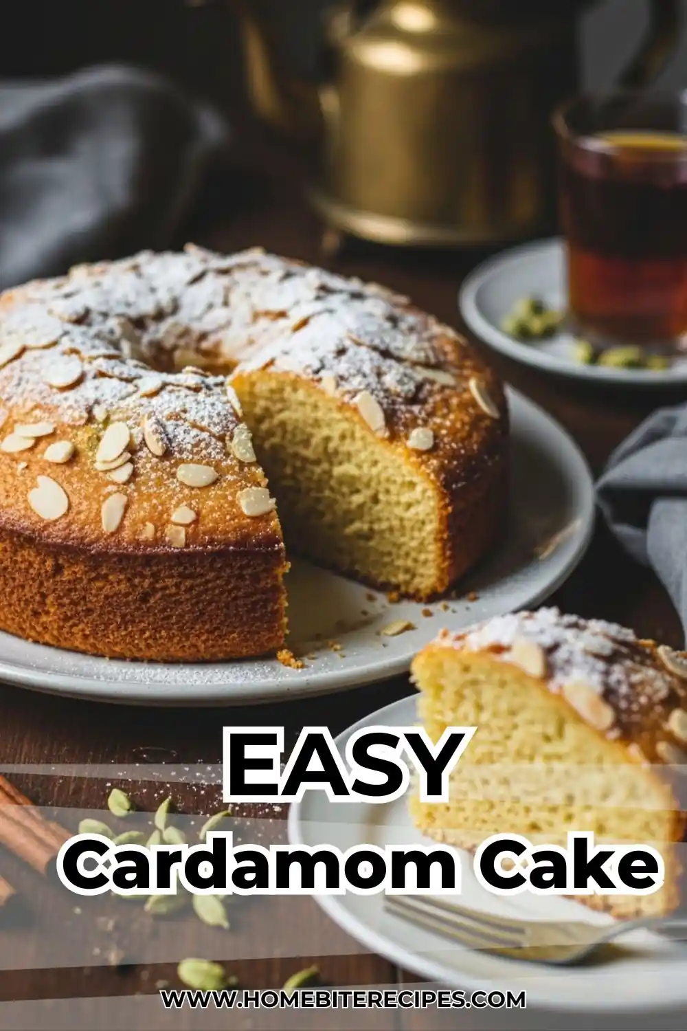 A golden, single-layer cardamom spice cake dusted with powdered sugar and almond flakes on a rustic wooden table.