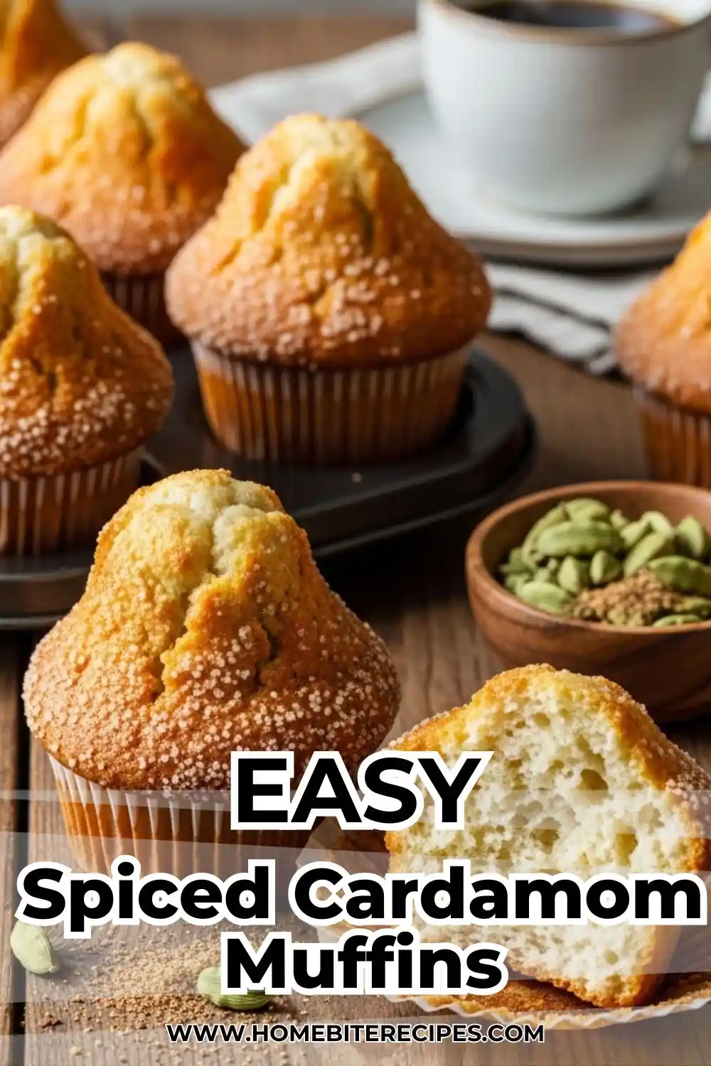 Close-up of golden-brown spiced cardamom muffins with sugary tops on a rustic wooden table next to a cup of coffee and cardamom pods.